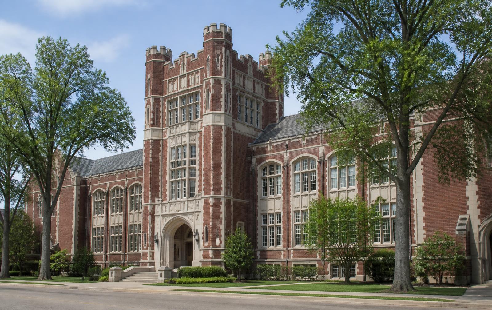 Historic brick high school building in a Toledo neighborhood